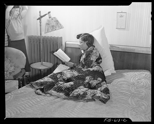 Untitled photo, possibly related to: Washington, D.C. Jewal Mazique [i.e. Jewel], worker at the Library of Congress, spends much of her time reading