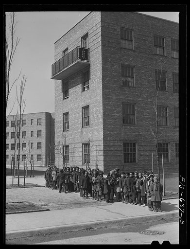 Chicago, Illinois. Ida B. Wells Housing Project. Children lining up to go to kindergarten class at the community center
