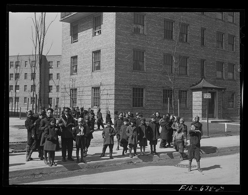 Chicago, Illinois. Ida B. Wells Housing Project. Children lining up to go to kindergarten class at the community center