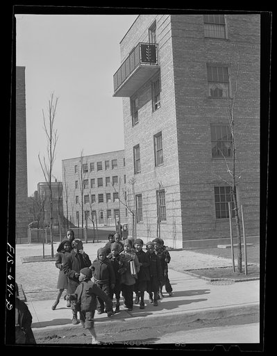 Chicago, Illinois. Ida B. Wells Housing Project. Children lining up to go to kindergarten class at the community center