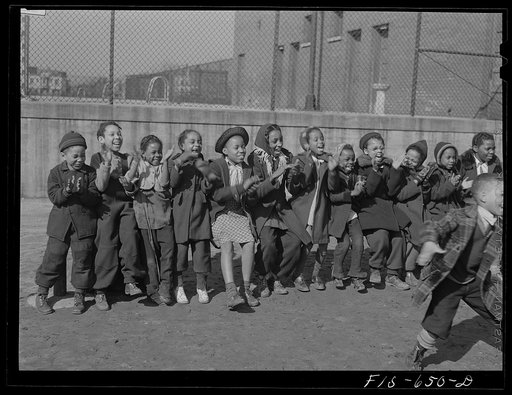 Chicago, Illinois. Ida B. Wells Housing Project. Children playing a game in the playground