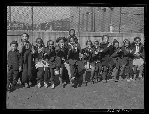 Chicago, Illinois. Ida B. Wells Housing Project. Children playing a game in the playground