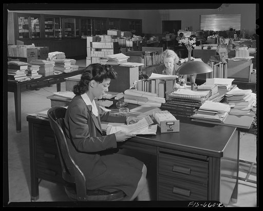 Washington, D.C. Jewel Mazique working in the accessions division of the Library of Congress