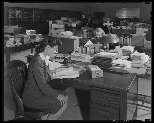 Untitled photo, possibly related to: Washington, D.C. Jewel Mazique working in the accessions division of the Library of Congress