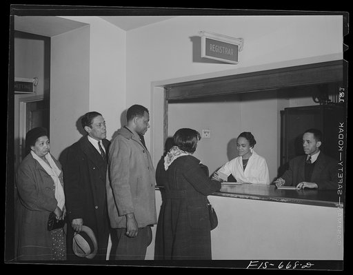 Untitled photo, possibly related to: Chicago, Illinois. Provident Hospital. At the registration desk at the clinic