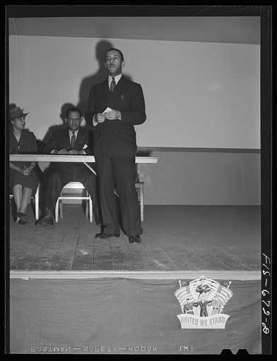 Chicago, Illinois. Ida B. Wells Housing Project. Mr. Daniel Bonaparte, director of recreational activities, speaking at a meeting of the tenants