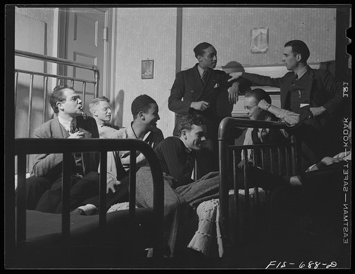 Untitled photo, possibly related to: Chicago, Illinois. A group of young men, most of them students at the University of Chicago, who live cooperatively in a large house