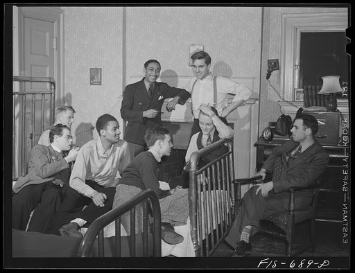 Untitled photo, possibly related to: Chicago, Illinois. A group of young men, most of them students at the University of Chicago, who live cooperatively in a large house