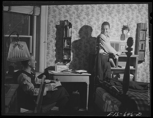 Untitled photo, possibly related to: Chicago, Illinois. Two of a group of young men who live in cooperatively in large house
