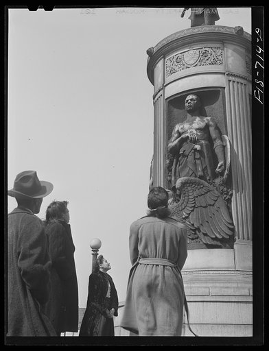 Untitled photo, possibly related to: Chicago, Illinois. High school students at the monument in honor of Negro soldiers killed in World War I