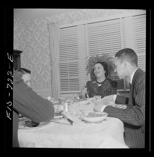 Untitled photo, possibly related to: Washington, D.C. Negro family at dinner. The husband is a doctor, the wife a teacher, the son a student at Howard University, and the daughter in high school