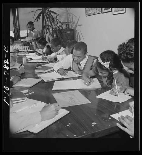 Untitled photo, possibly related to: Washington, D.C. Editorial meeting working on the student paper at the Banneker Junior High School