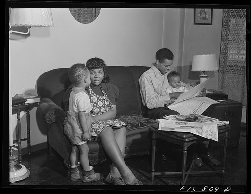 Chicago, Illinois. Ida B. Wells Housing Project. Family of Mr. Edward Vaughn, living in one of the apartments. Mr. Vaughn is doing work for the War Department