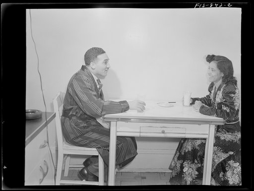 Untitled photo, possilby related to: Washington, D.C. Jewal Mazique [i.e. Jewel], worker at the Library of Congress, getting a late snack