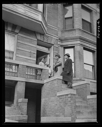 Washington, D.C. Jewal Mazique [i.e. Jewel], worker at the Library of Congress, and her husband, Dr. Mazique, returning from a shopping trip