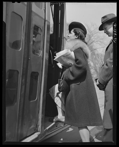 Untitled photo, possibly related to: Washington, D.C. Jewal Mazique [i.e. Jewel], worker at the Library of Congress, going home