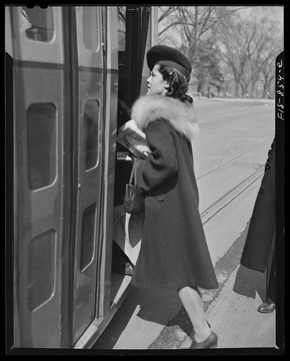 Untitled photo, possibly related to: Washington, D.C. Jewal Mazique [i.e. Jewel], worker at the Library of Congress, going home