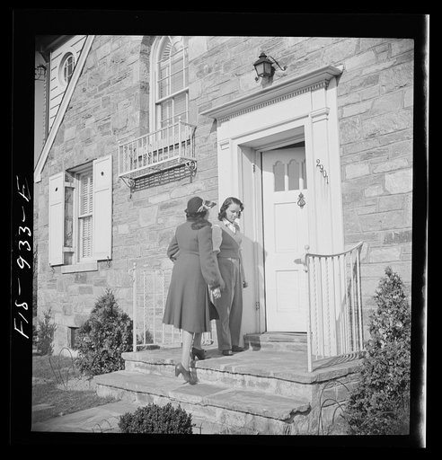 Untitled photo, possibly related to: Washington, D.C. Teacher being greeted by her daugther as she comes home from work
