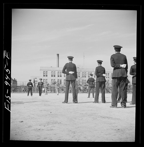 Untitled photo, possibly related to: Washington D.C. Military unit in Armstrong Technical High School being trained by an U.S. Army lieutenant