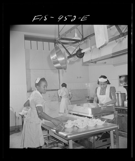 Washington, D.C. Students help prepare lunch for the school cafeteria at the Armstrong Technical High School