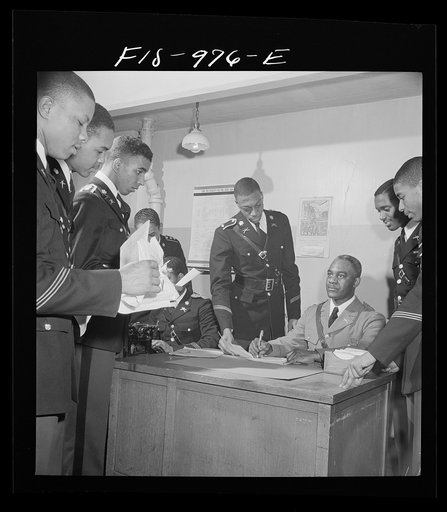 Washington, D.C. Members of the military unit at the Armstrong Technical High School reporting to a regular army officer