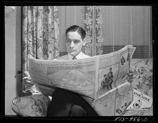 Minneapolis, Minnesota. Mr. A.S. Brink keeps abreast with world news events