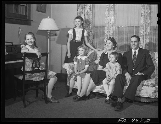 Minneapolis, Minnesota. Mr. Authur Sven Brink and his family. Mr. Brink is a welder at an important war factory in the Minneapolis area. He lives in a medium-sized house with his wife Hilda and their four children: Mary Jane, four, Gloria, seven, Caren, ten, and Ruth twelve. Mr. Brink was born in Sk
