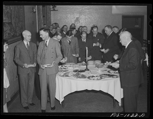 Minneapolis, Minnesota. Before the meeting of the Swedish Club opens, everyone partakes of the smorgasbord