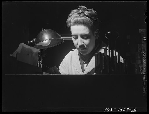 Untitled photo, possibly related to: Minneapolis, Minnesota. Carl Westin, whose father Olaf and mother Elsa come from the town of Sandarne, province of Helsingland, Sweden. He is now working in a small machine shop turning out tools and dies for the war plants in the Minneapolis area