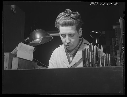 Minneapolis, Minnesota. Carl Westin, whose father Olaf and mother Elsa come from the town of Sandarne, province of Helsingland, Sweden. He is now working in a small machine shop turning out tools and dies for the war plants in the Minneapolis area