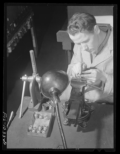 Minneapolis, Minnesota. Lars Anderson, whose father is the president of the Swedish Sciety in Minneapolis. His parents come from the town of Melurud, province of Dalsland, Sweden. He has just started working in this small machine shop turning out tools and dies for the war plants in the Minneapolis 