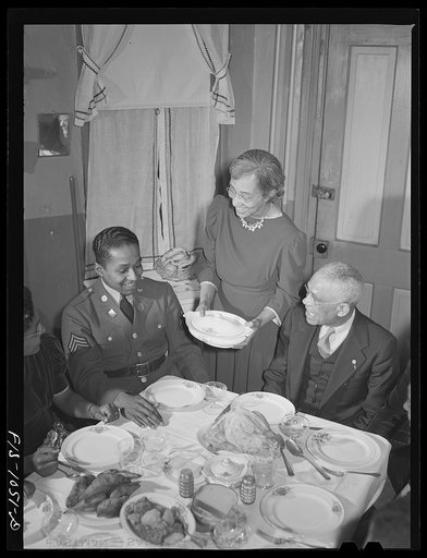 Untitled photo, possibly related to: Baltimore, Maryland. Sargeant Franklin Williams, home on leave from Army duty, with his father and mother