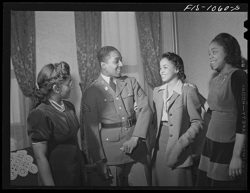 Baltimore, Maryland. Sargeant Franklin Williams, home on leave from Army duty, with his sister and his best girl, Ellen