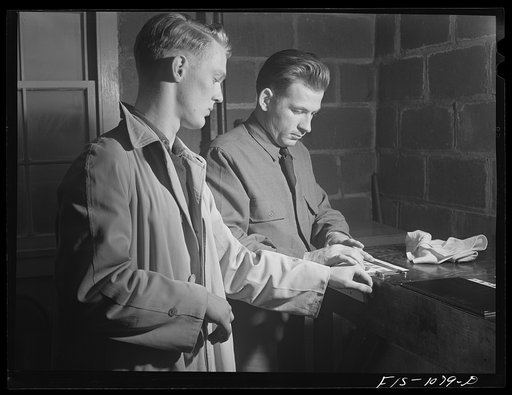 Swedish-American selectee in Minnesota being fingerprinted as he is inducted into the U.S. Army