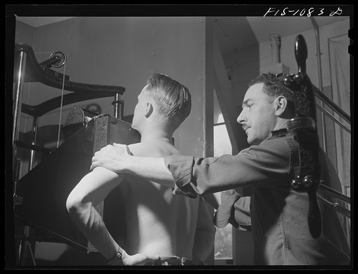 Swedish-American selectee in Minnesota taking a physical examination as he is inducted into the U.S. Army