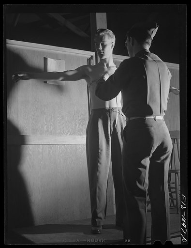 Swedish-American selectee in Minnesota taking a physical examination as he is inducted into the U.S. Army