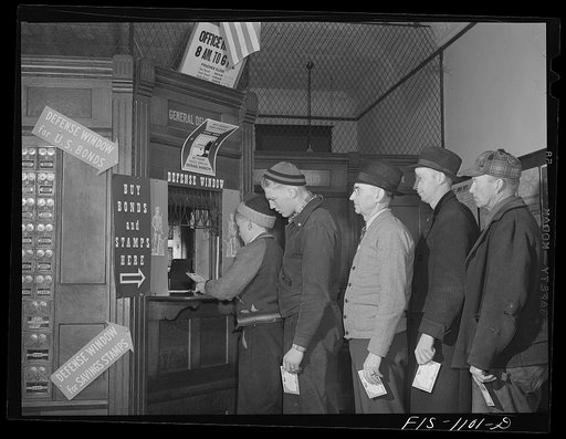 A Swedish postmaster in a small Minnesota town selling defense bonds to Swedish farmers