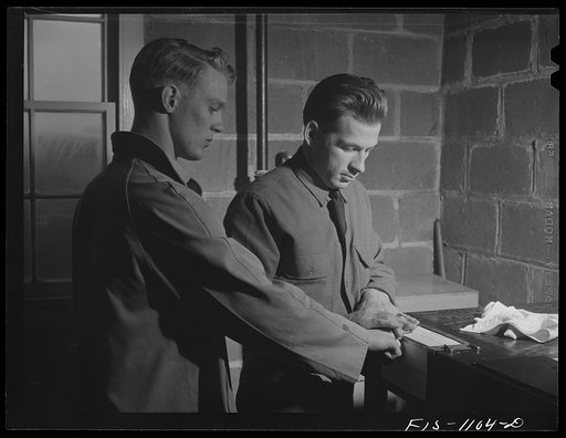Swedish-American selectee in Minnesota being fingerprinted as he is inducted into the U.S. armed forces