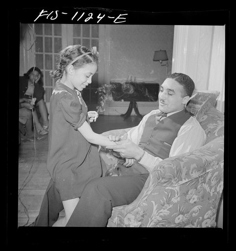 Washington, D.C. Doctor Mazique and a young niece who he and his wife Jewal Mazique [i.e. Jewel], worker at the Library of Congress, are raising and educating
