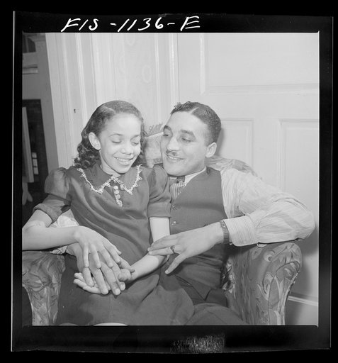 Untitled photo, possibly related to: Washington, D.C. Doctor Mazique and a young niece who he and his wife Jewal Mazique [i.e. Jewel], worker at the Library of Congress, are raising and educating