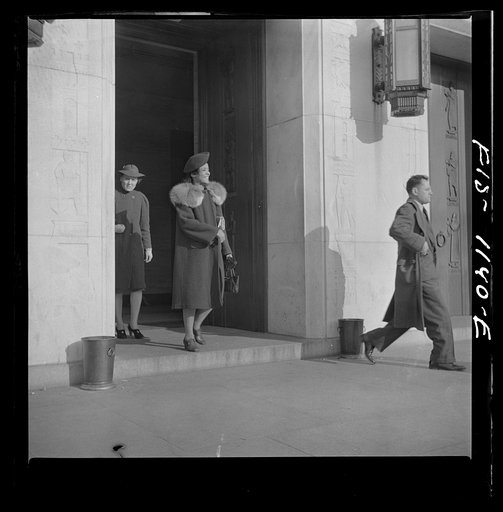 Untitled photo, possibly related to: Washington, D.C. Jewal Mazique [i.e. Jewel] leaving the Library of Congress where she works