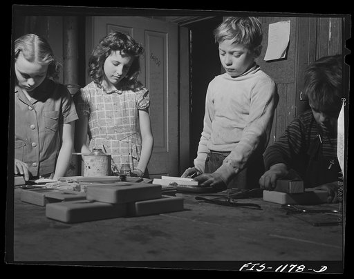 Minneapolis, Minnesota. Children of Swedish parents at a settlement house making games for soldiers