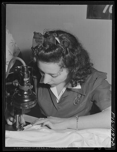 An employee of the Pacific Parachute Company. San Diego, California