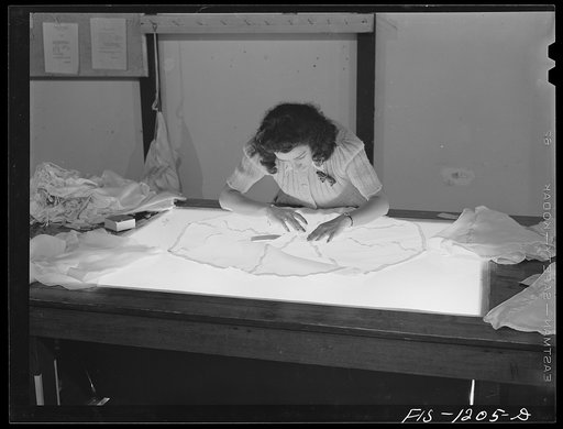 Inspection of the pilot parachute is accomplished by means of transmitted light. Pacific Parachute Company. San Diego, California