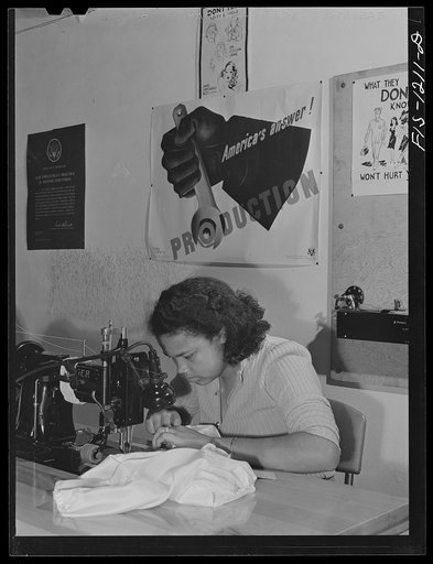 Working on the main seams of pilot parachutes, Pacific Parachute Company. San Diego, California. A double-needle sewing machine is used