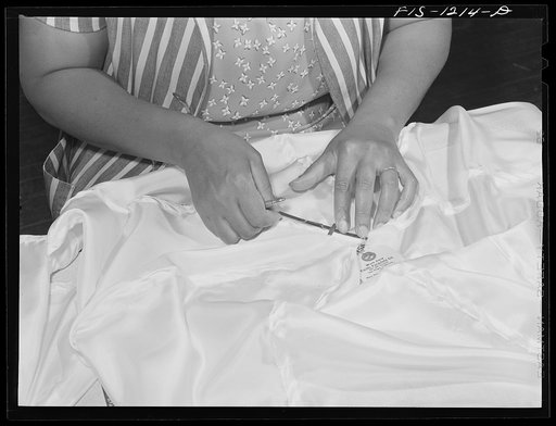 Marking the parachute where the shrouds are to be rigged. Pacific Parachute Company. San Diego, California