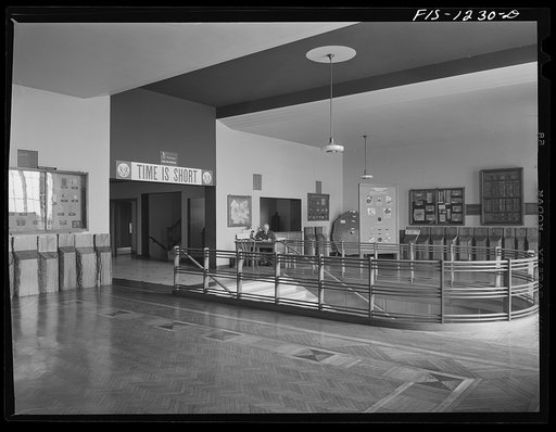 Forest Products Laboratory, Madison, Wisconsin. The entrance hall and reception room. The floors and railings are made of wood, and along the walls are exhibits of the work being done in the laboratory