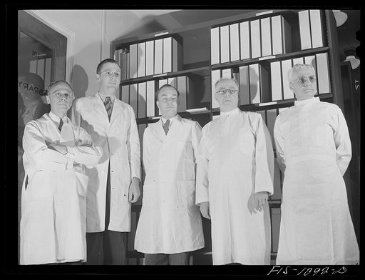 Dr. Davis, Dr. Steinhaus, Dr. Parker (director), and Dr. Cooley, of the Rocky Mountain Laboratory at Hamilton, Montana (USPHS--United States Public Health Service)