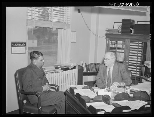 Dr. Pundit, of India, who has been studying methods at the Rocky Mountain Laboratory, with Dr. Parker, Director of the Laboratory (USPHS--United States Public Health Service )