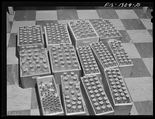 Typhus vaccine ready for packing and shipment. Here is enough vaccine to innoculate a town of 15,000 population. USPHS (United States Public Health Service)  Rocky Mountain Laboratory. Hamilton, Montana